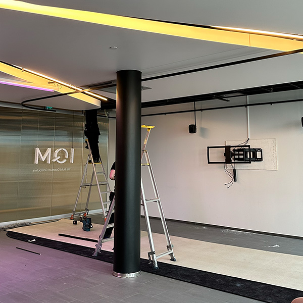 IQM quantum computer showroom design behind the scenes lighting