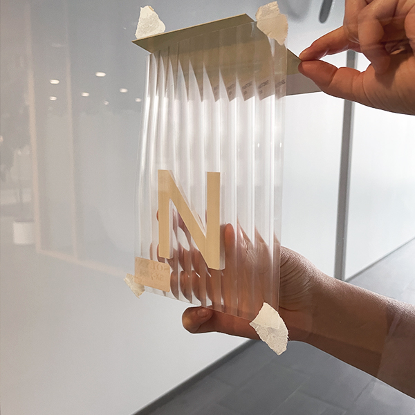 IQM quantum computer showroom design behind the scenes logo taping graphics