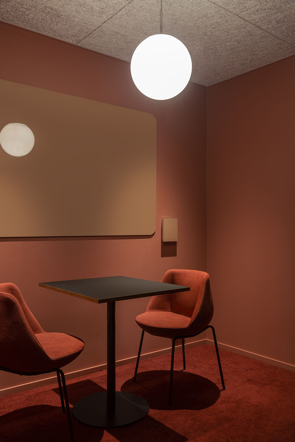 Supermetrics office design meeting room red