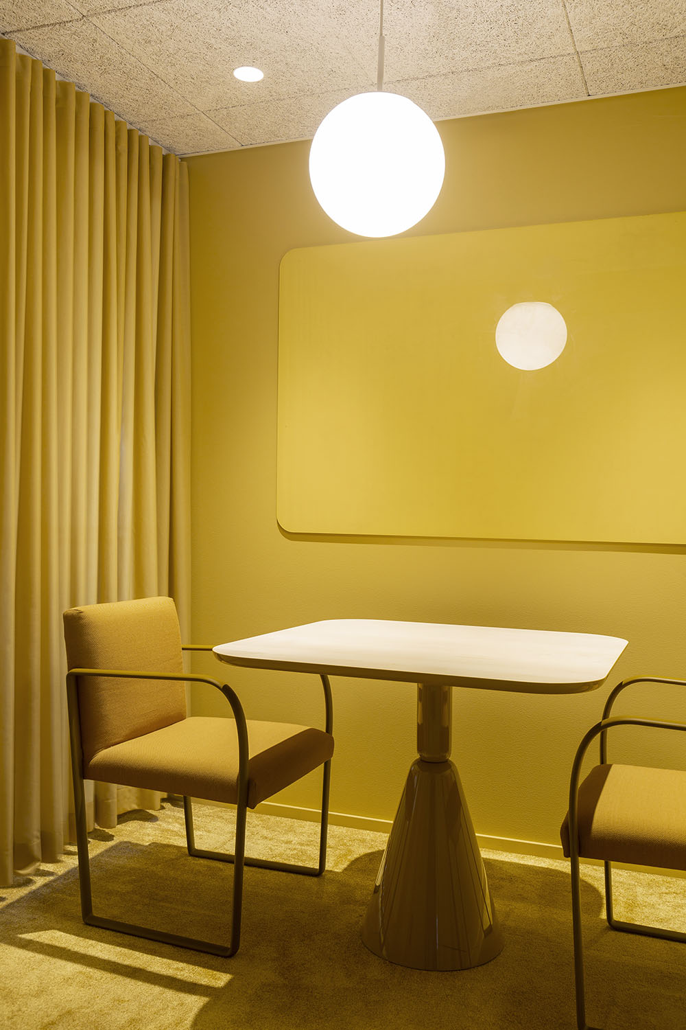 Supermetrics office design meeting room yellow